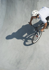 Obraz premium Teenager at Skateboard Park