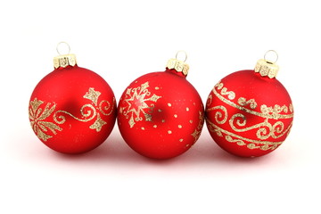 Christmas red  balls on a white background.