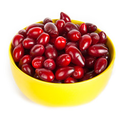bowl with ripe Cornelian cherries
