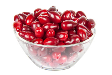 glass bowl with ripe Cornelian cherries