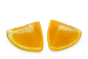Slices of peeled orange on white background