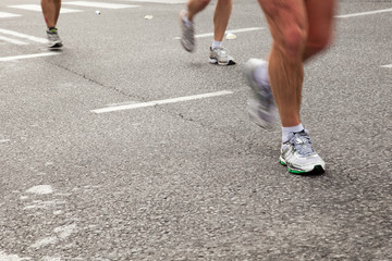 Fototapeta na wymiar People running in city marathon