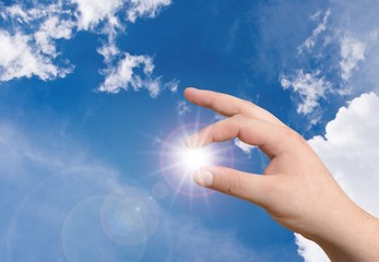 hand holding the sun..