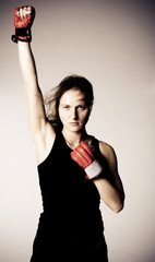 Beautiful girl with boxing gloves.