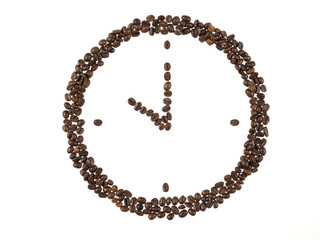 forma di orologio fatta con i chicchi di caffe