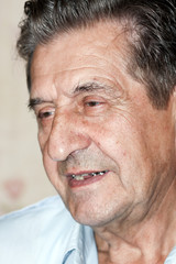 portrait of an elderly man smiling