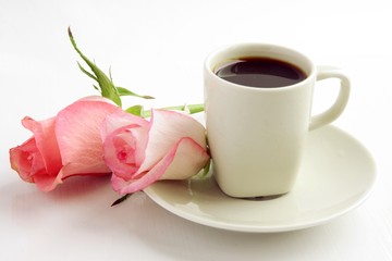 Obraz na płótnie Canvas cup of black coffee and pink rose