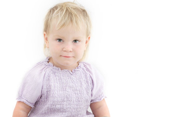 Naklejka premium studio portrait of cute toddler girl over white