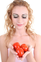 portrait of young woman with tomatoes