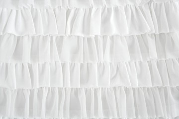 pleated skirt fabric fashion in white closeup - obrazy, fototapety, plakaty