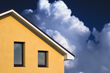 abstract beautiful house facade under blue sky