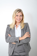 Blond businesswoman doing expressions on white background