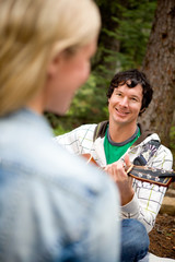 Man Serenading a Woman with Guitar