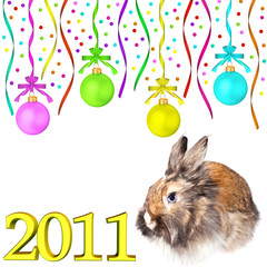 Rabbit and multi-colored dull christmas balls hanging on tapes