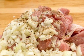 filet meat with raw onion for barbecue.