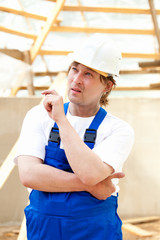 builder looking at the construction project