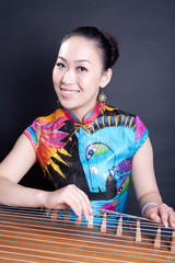 girl playing Chinese zither