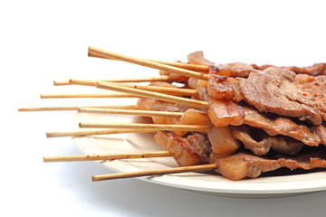 Roast Pork in a Stick on White Background