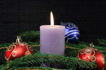 kerze mit tannenzweig