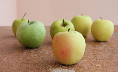 Ripe apples on the wood structure