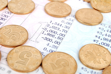 Coins on bankbook