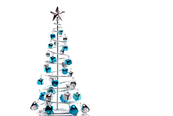 Christmas tree made out of blue and silver jingle bells