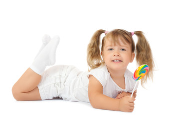 Little smiling girl with lollipop