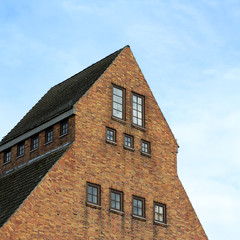 Fototapeta na wymiar old building on rostock harbor, germany