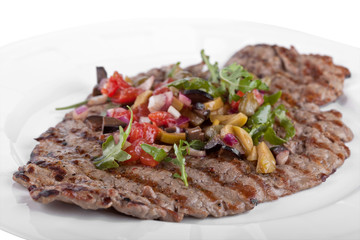 meat on a white plate