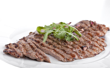 meat on a white plate