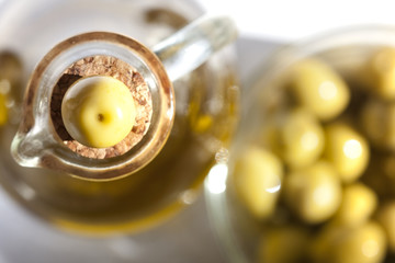 olives and a bottle of olive oil