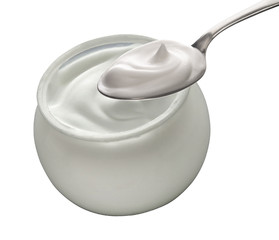 jar of yogurt with a small spoon