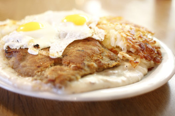 Country fried steak and eggs