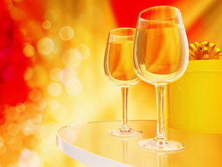 Champagne in glasses on a yellow and red background