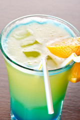 Summer drink decorated with a slice of orange