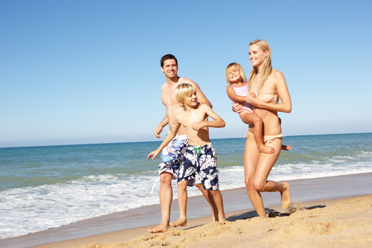 Portrait Of Family On Summer Beach Holiday