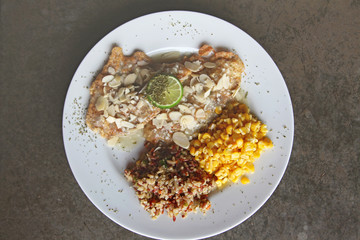 lemon deep fried snapper fish dressing with corn and red rice