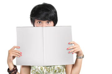 shot of young girl holding a blank magazine