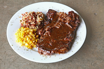 New York beef Steak dressing with corn and red rice