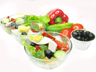 greek salad in bowls