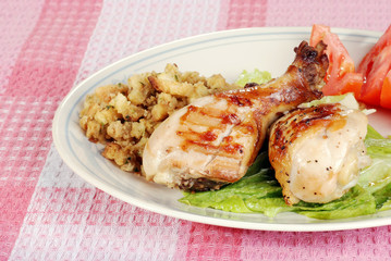 barbecue chicken drumsticks with stuffing and vegetables
