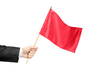Hand holding a red flag