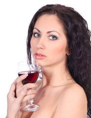 beautiful woman with glass of red wine