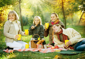 Happy Big Family in Autumn Park.Picnic.Copy-space