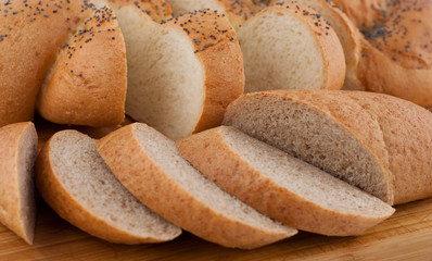 Bread slices on board closeup.