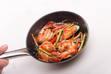 seafoods and vegetables on pan