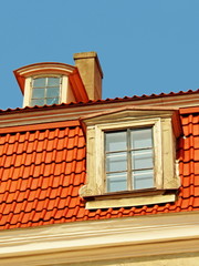 Red tile roof, dormers and chimney