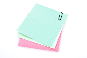 Three reminder notes  with clip isolated on white