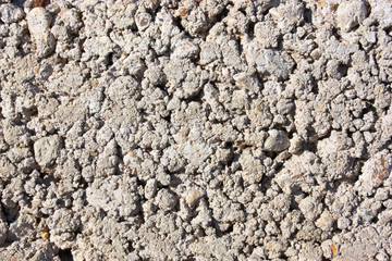 Structure of a concrete and stone wall
