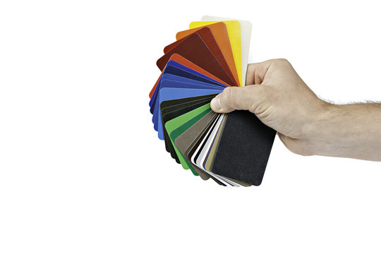 sample metal RAL color chart  hold by human hand